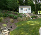 sloped mulch and planting bed